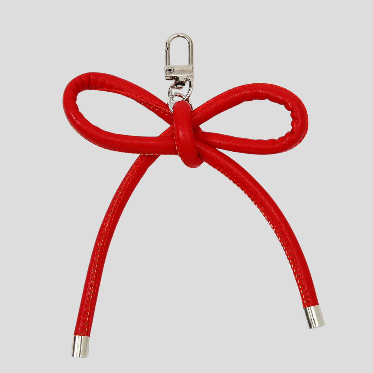 Charm para bolso con lazo