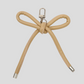Charm para bolso con lazo