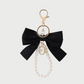 SILK BOW BAG CHARM