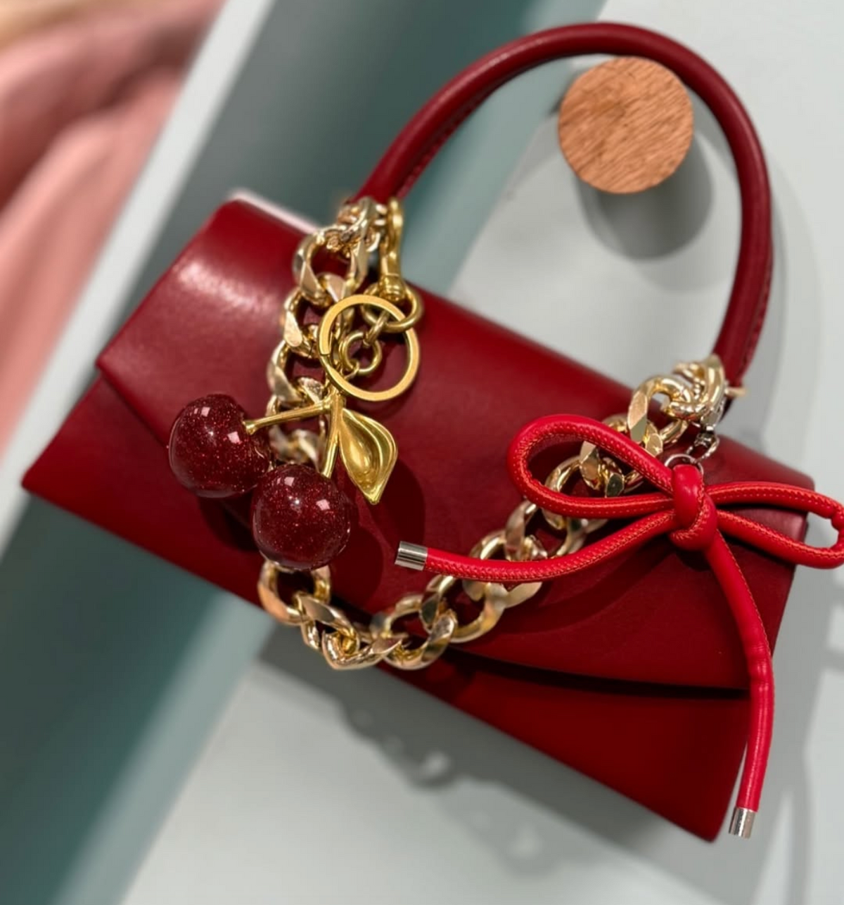 Charm para bolso con lazo